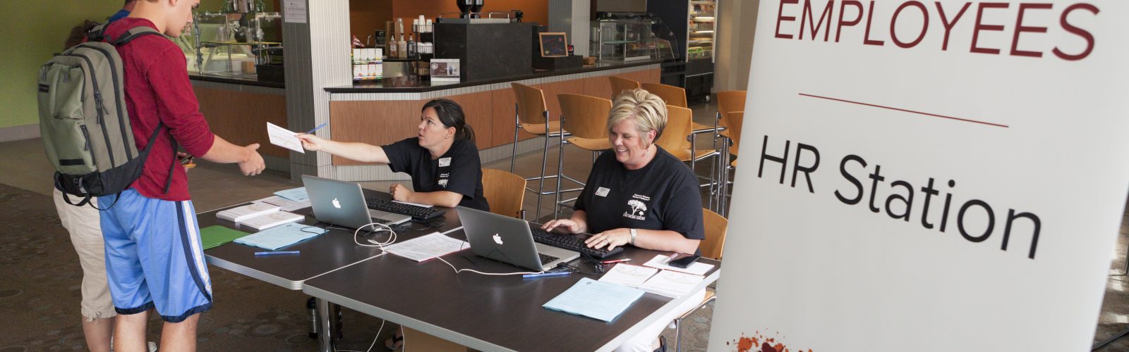 HR early move-in student paperwork processing station.