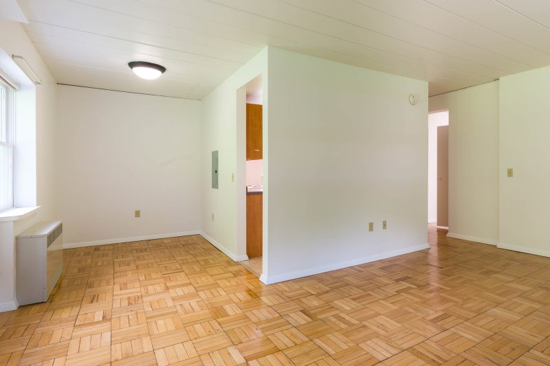 The living room in a 1 Bedroom University Houses apartment.