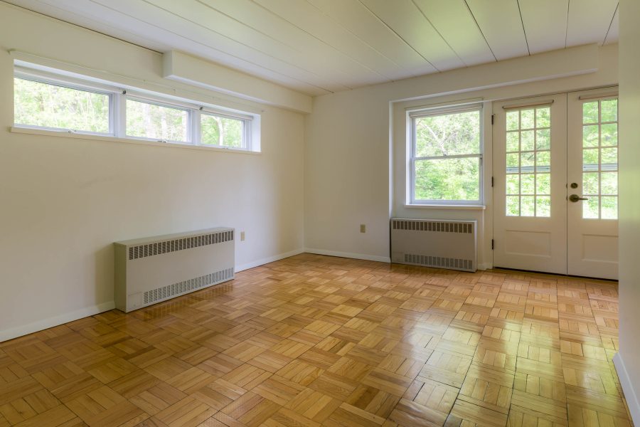 The living room in a 1 Bedroom University Houses apartment.