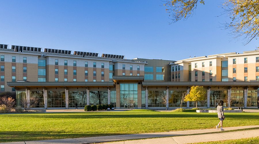 Exterior of Dejope Residence Hall in the fall
