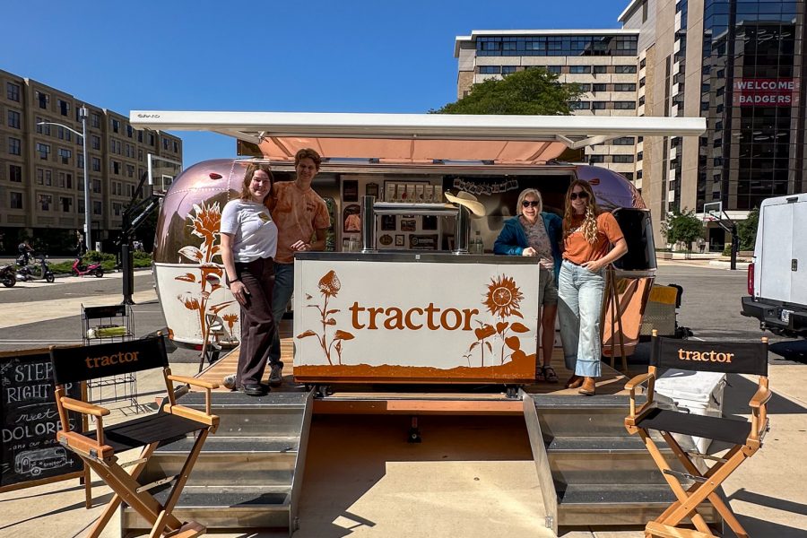 Tractor Beverage Pop Up Airstream with four staff members posing