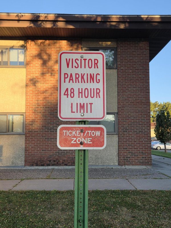 UA Visitor Parking sign