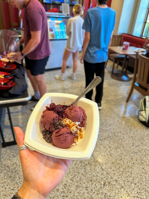 Acai Bowl with the pop up station and students in the background