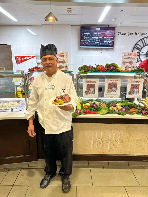 Chef Ernesto posing with his special entree at the Chef Appreciation lunch in Gordon Avenue Market
