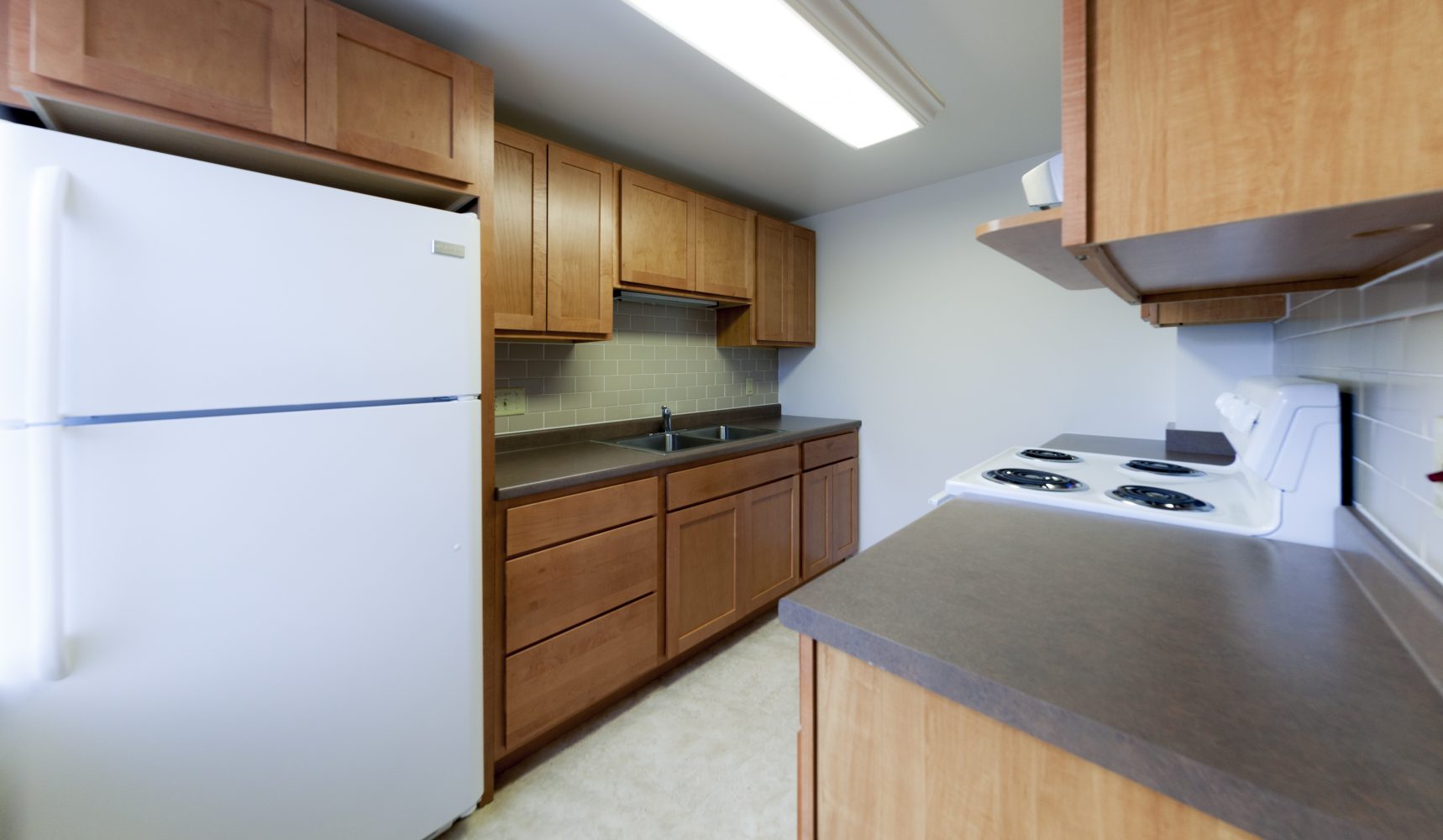 The kitchen in a 3 Bedroom University Houses apartment.