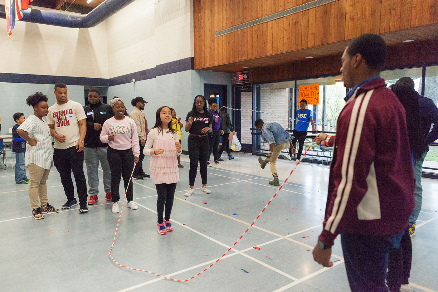 MLC residents jump rope with University Apartments children
