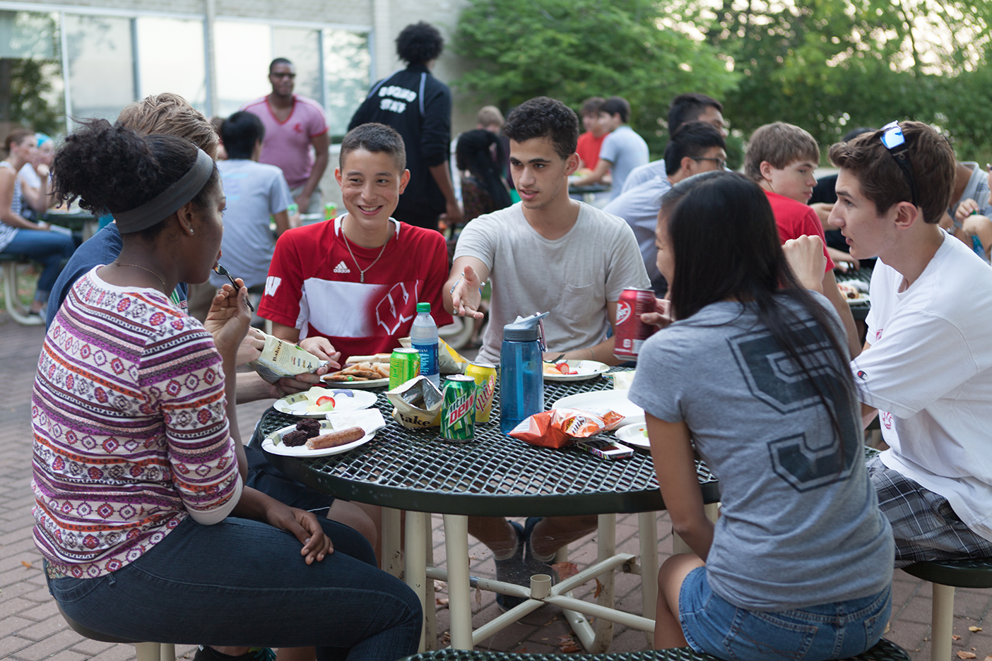Open House members share a meal at their convocation