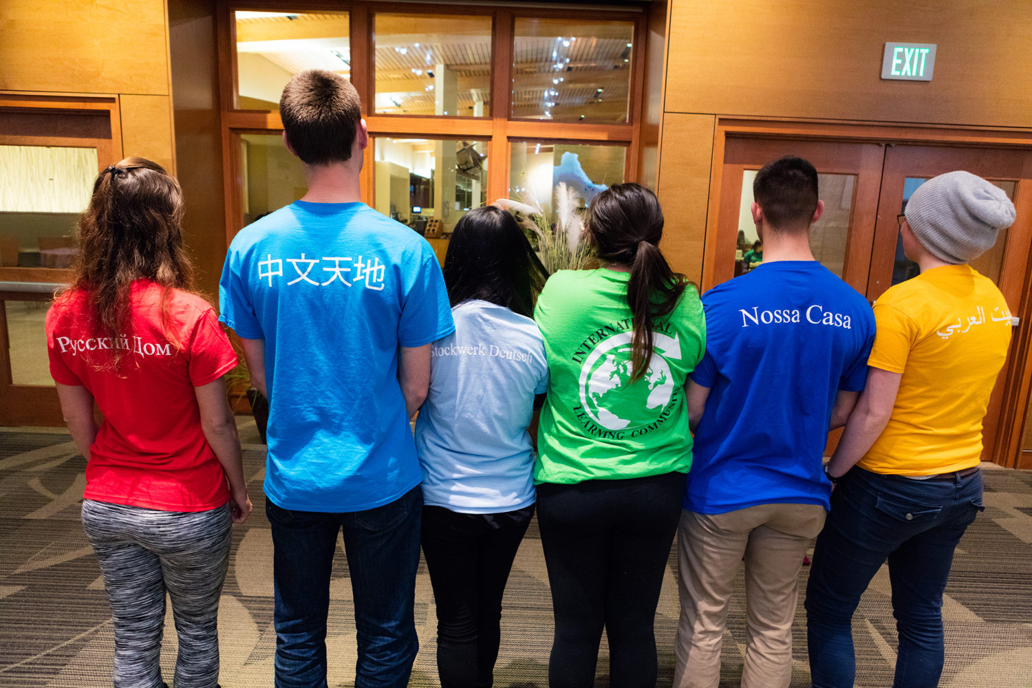 ILC residents show off their diverse t-shirts at their African dinner