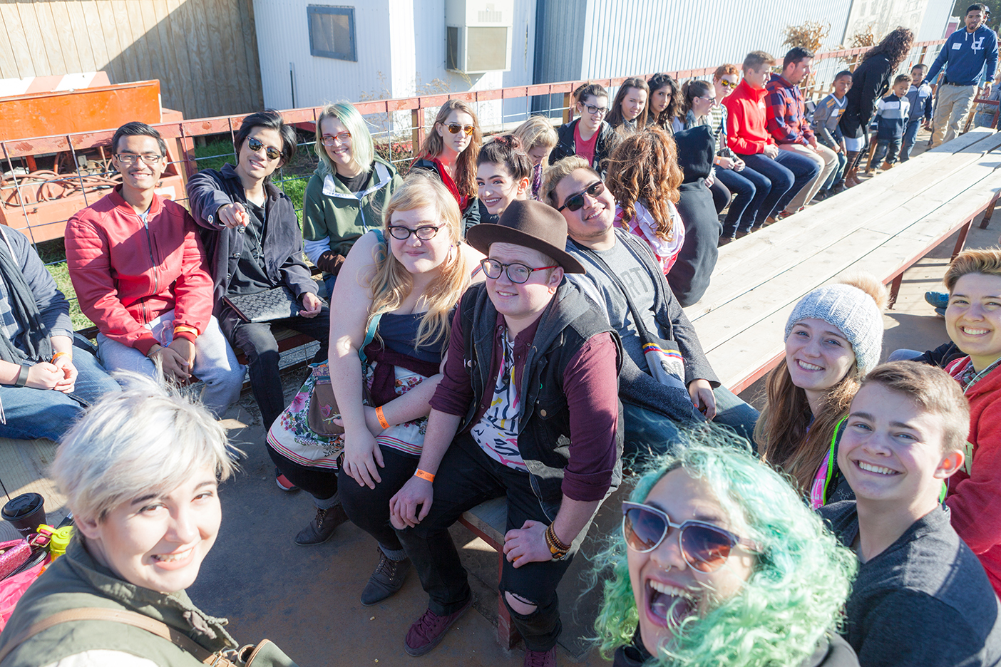 Open House residents take a wagon ride at an outside orchard