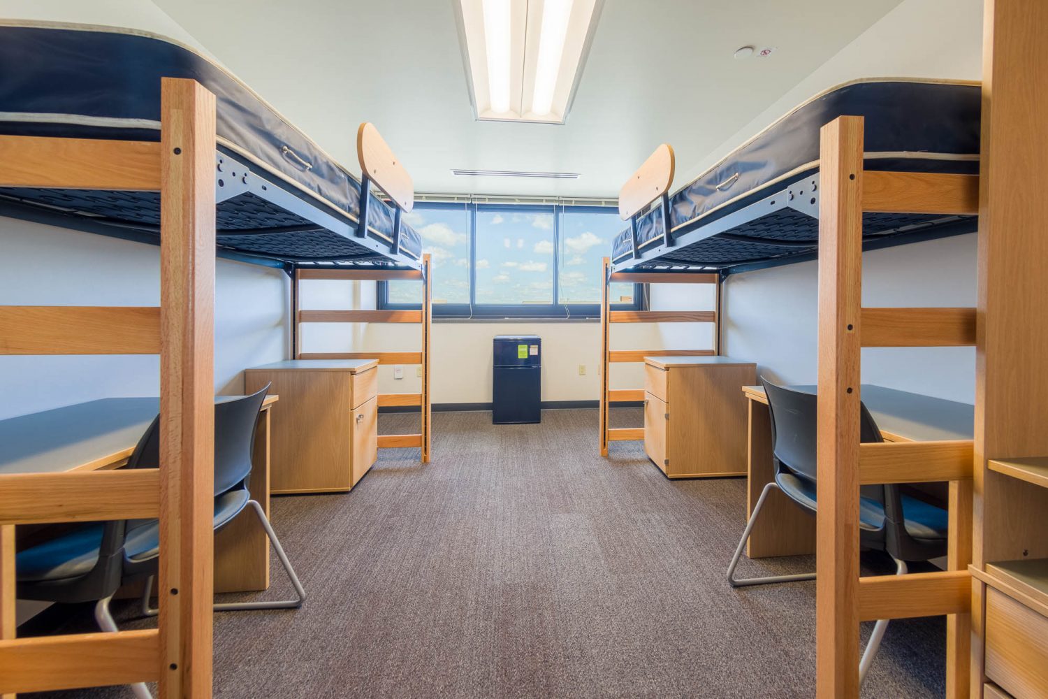An interior view of a 3-Window Double room on the 11th floor of Witte Residence Hall