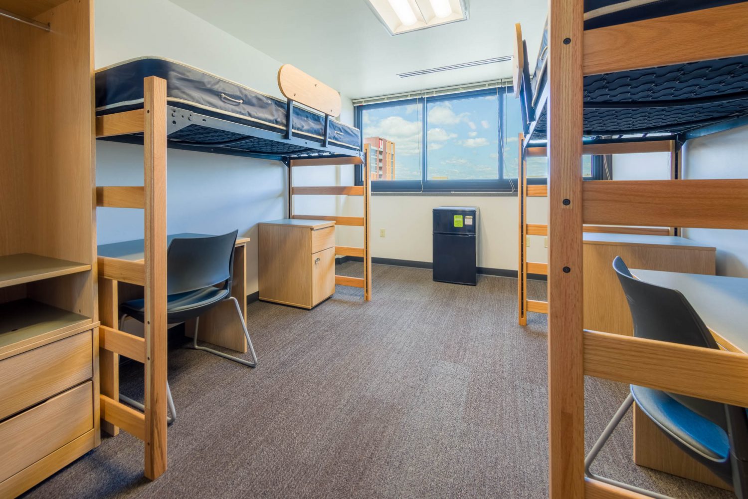 An interior view of a 3-Window Double room on the 11th floor of Witte Residence Hall