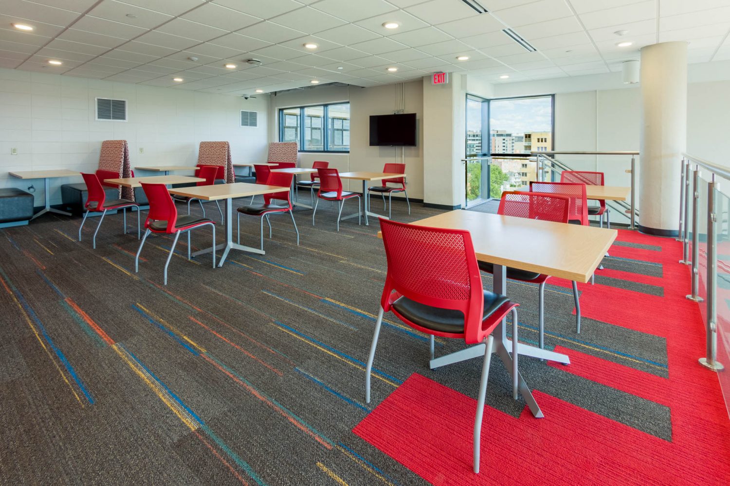 Interior of a two-story lounge in Witte Residence Hall