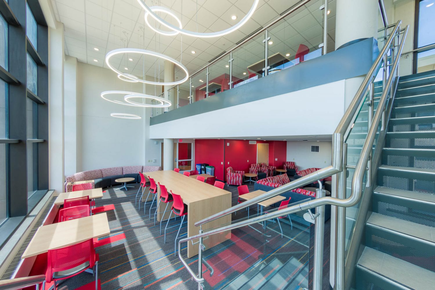 Interior of a two-story lounge in Witte Residence Hall
