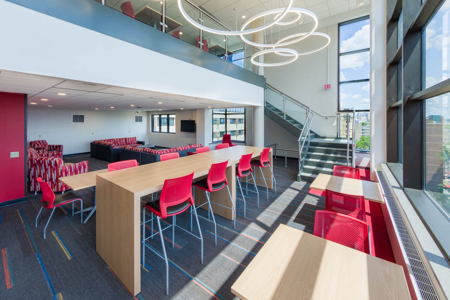 Interior of a two-story lounge in Witte Residence Hall