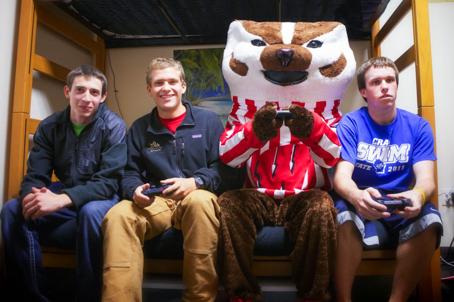 Bucky playing video games with residents