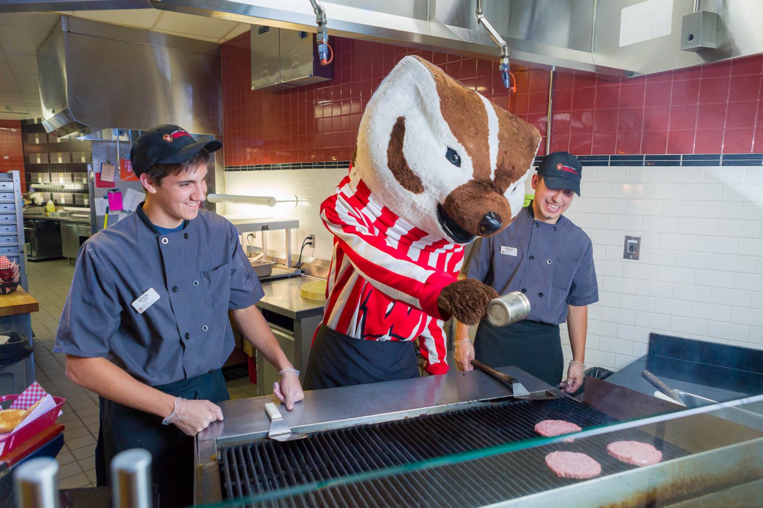 Bucky cooking with Dining staff