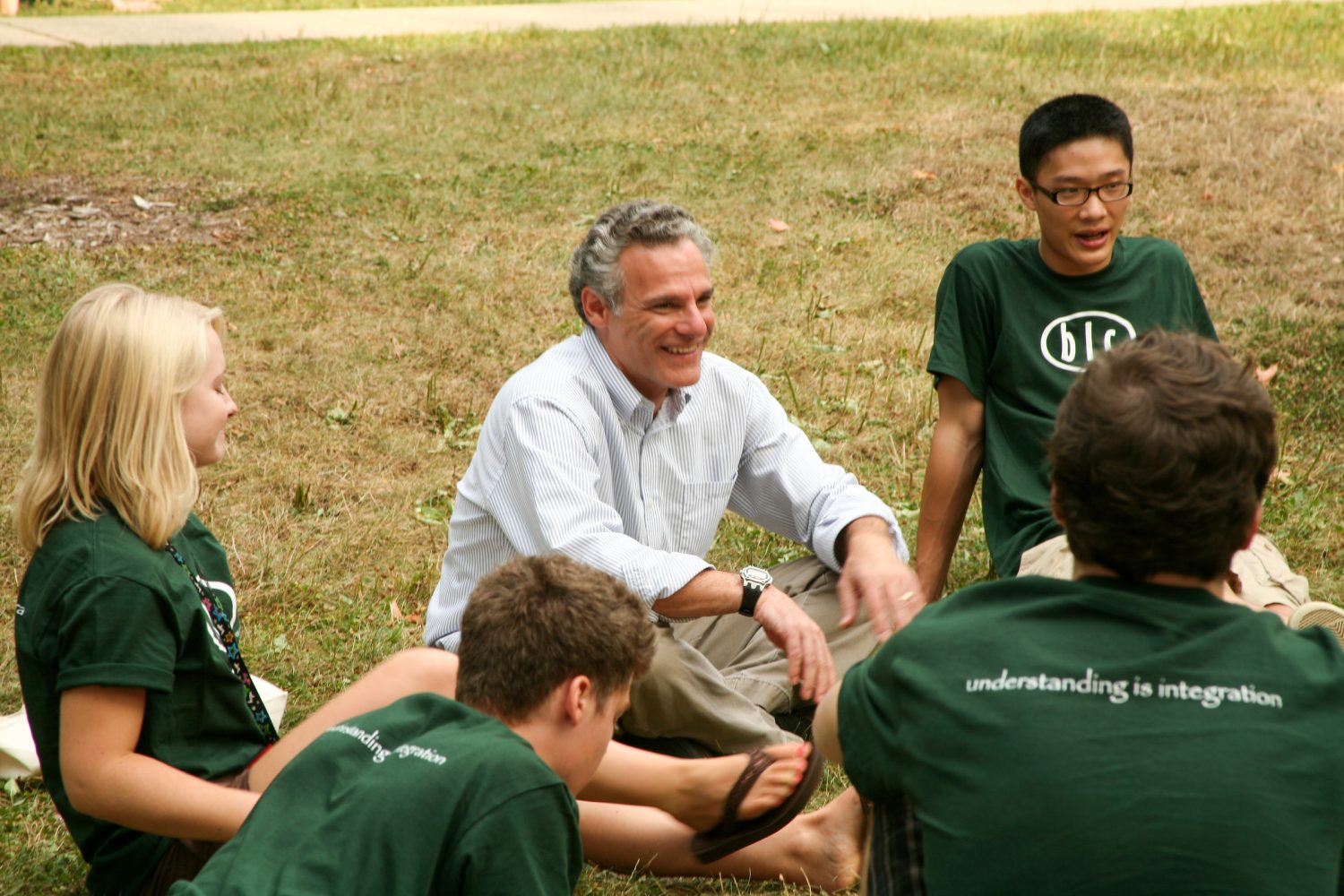 Aaron Brower with students at Convocation