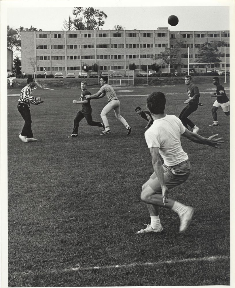 Students playing a game outside Bradley Hall