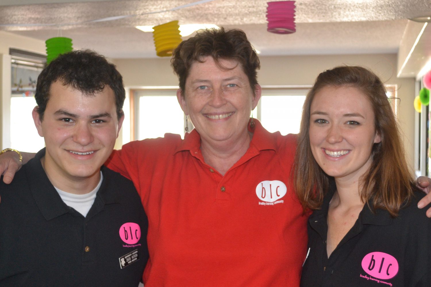 Peer Mentors Zack and Mari with Faculty Director Susan Brantly