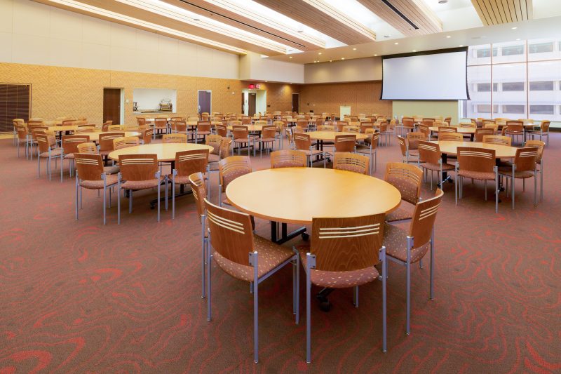 Interior of the Symphony room with round tables and chairs