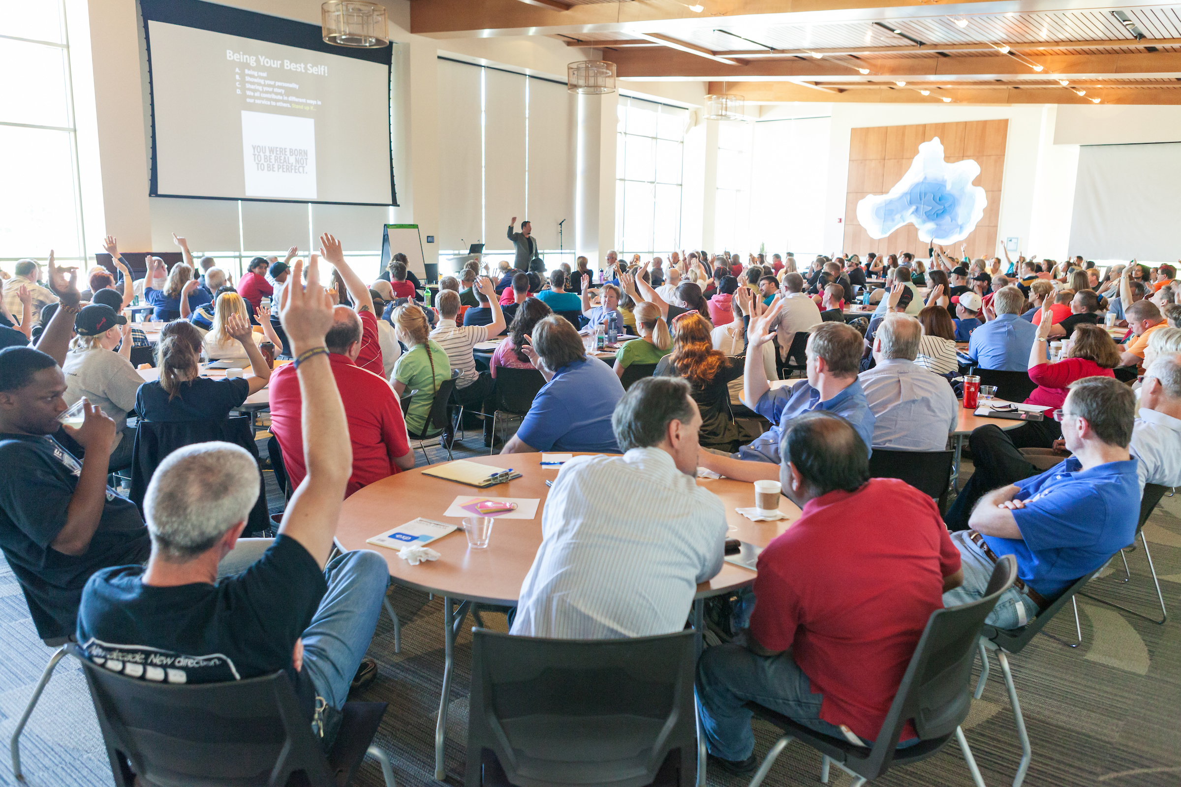 Summer staff meets in the Lake Mendota Room of Dejope Hall to kick-off conference services summer events May 29, 2014.