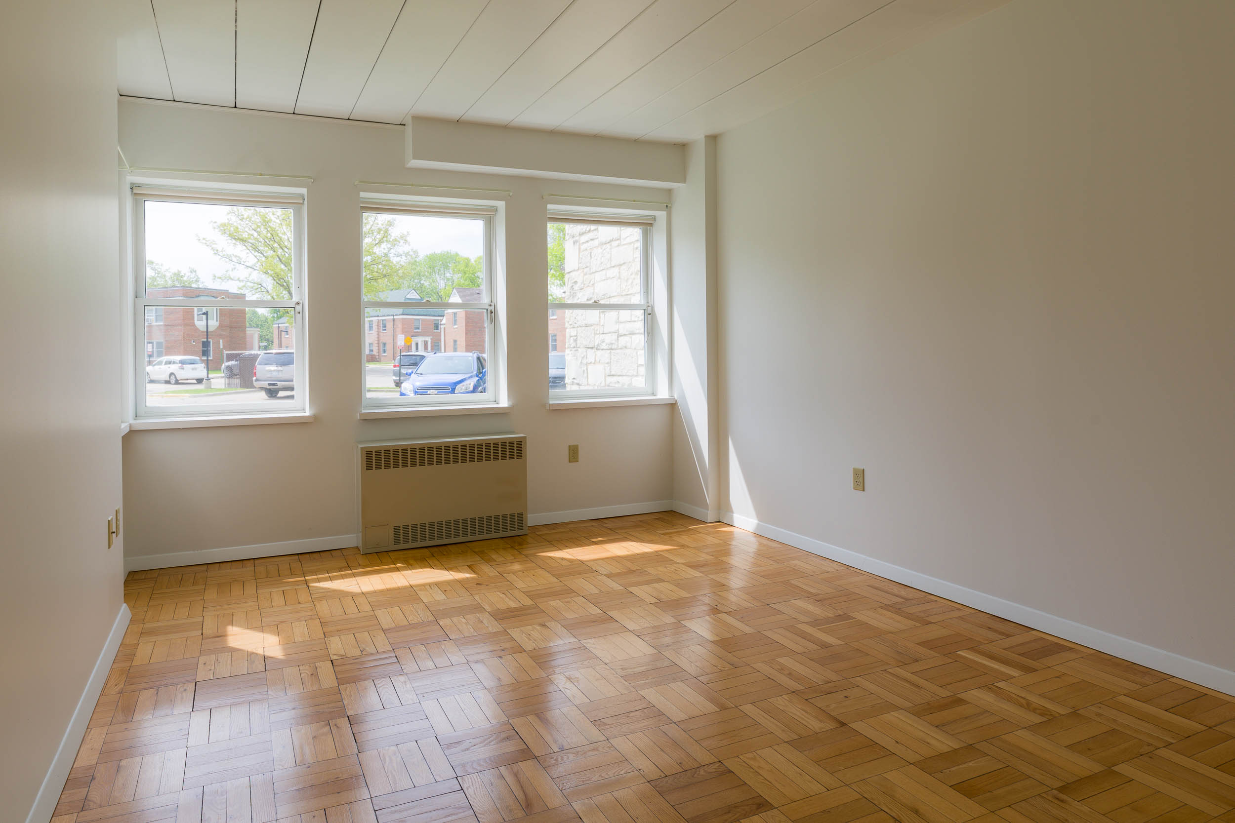 The bedroom in a 1 Bedroom University Houses apartment.