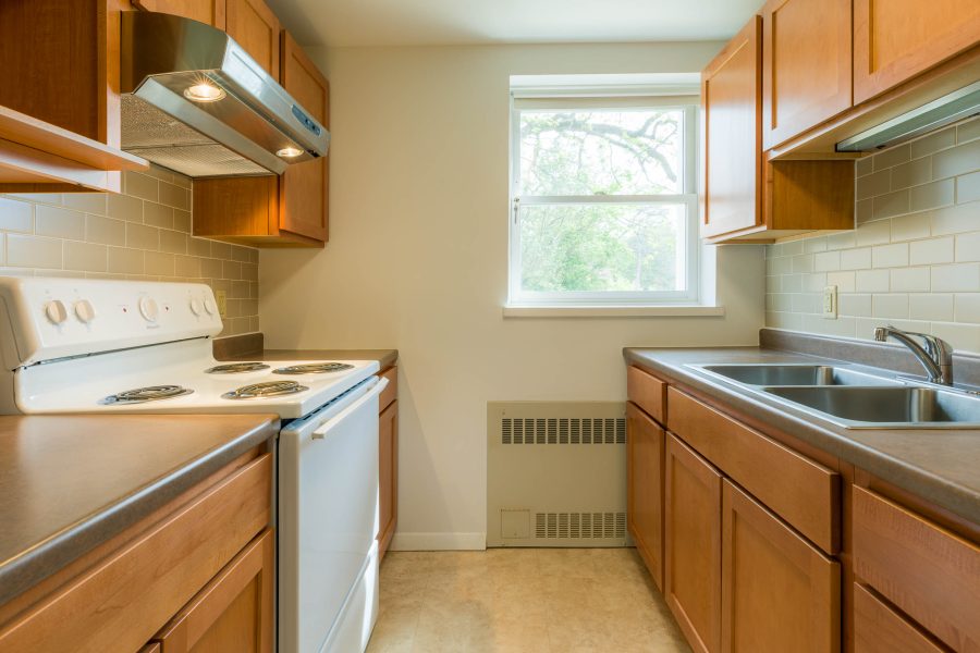 The kitchen in a 1 Bedroom University Houses apartment.
