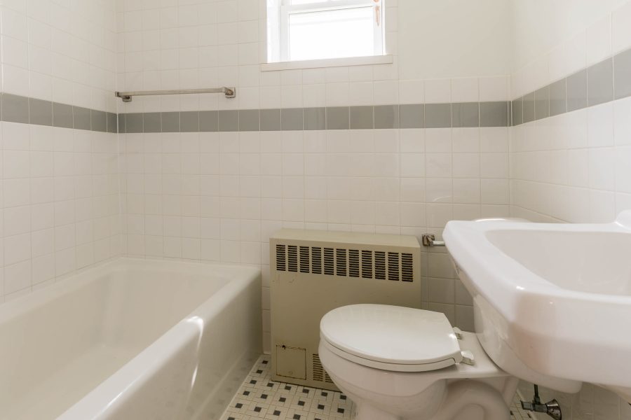 The bathroom in a 1 Bedroom University Houses apartment.