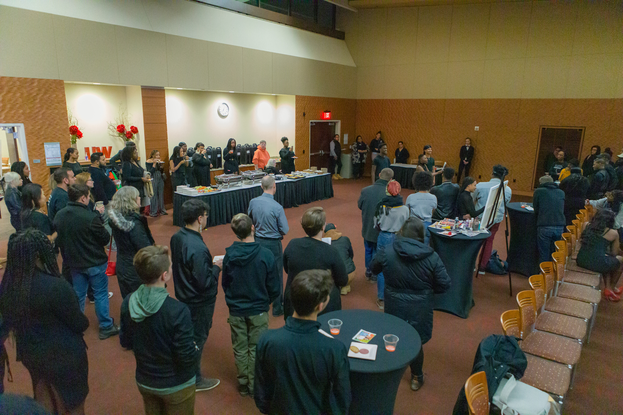 Large group having a cocktail hour in the Sonata room
