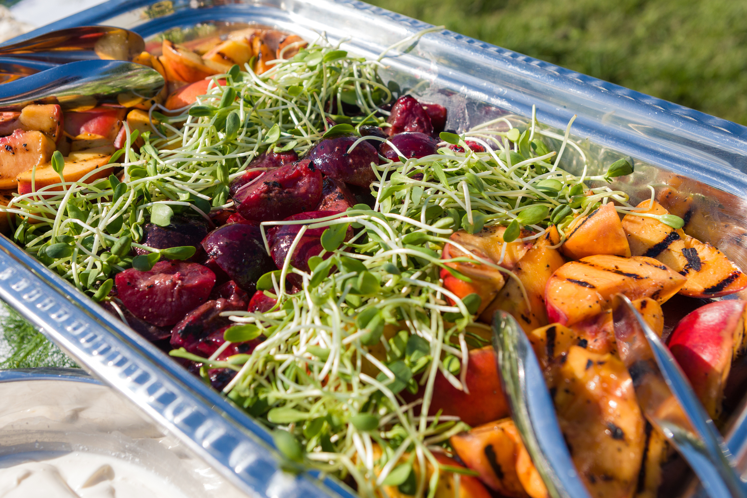 Colorful food in a metal serving tray