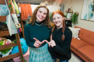 Winners of the 2023 Best Room Contest in their room in Cole Residence Hall