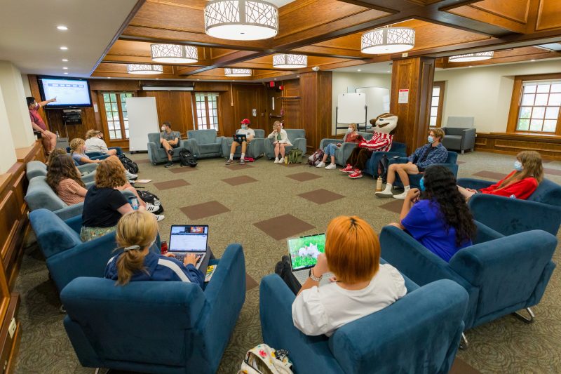 Students gathered around in a seminar.