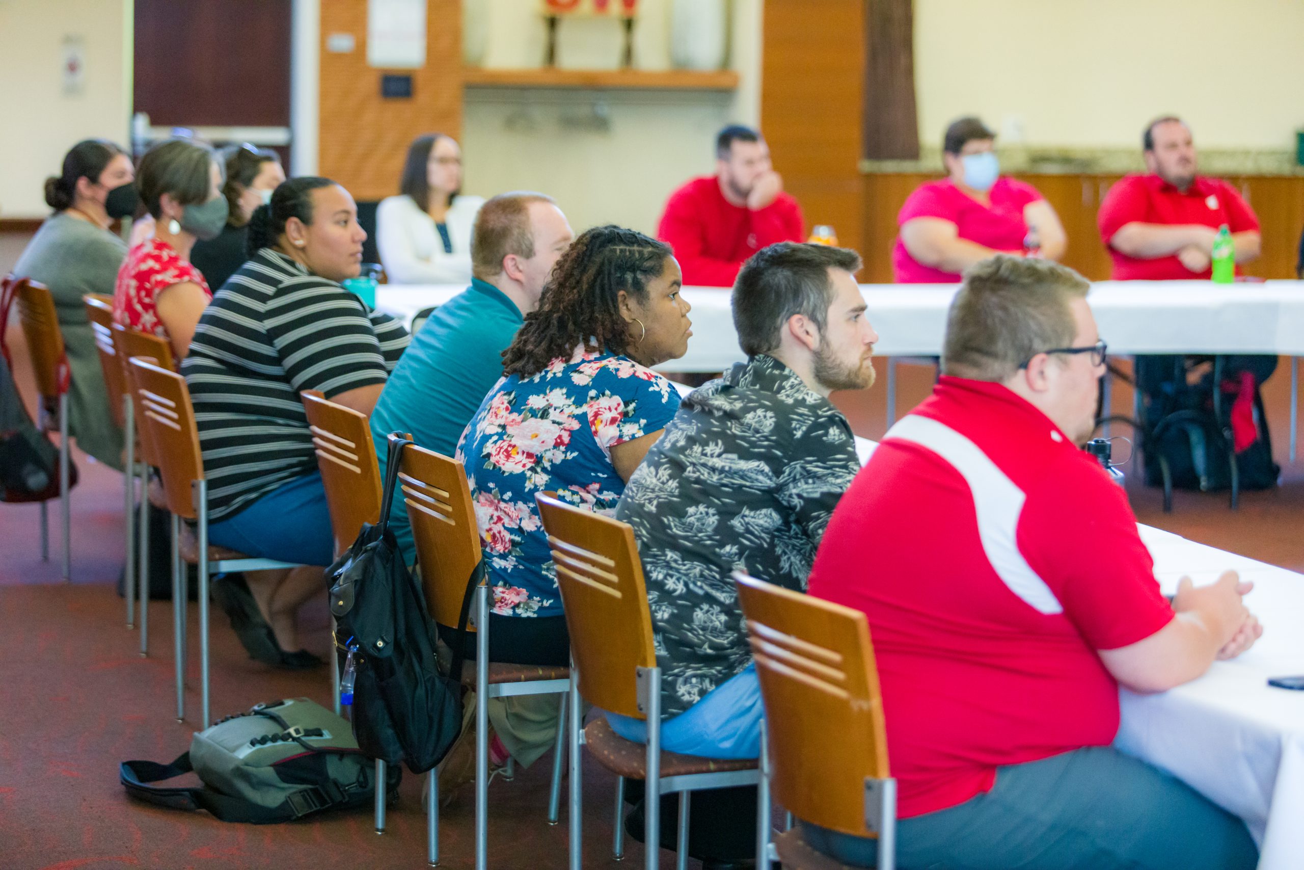 Residence Life staff pictured at a Housing Speaker Series event