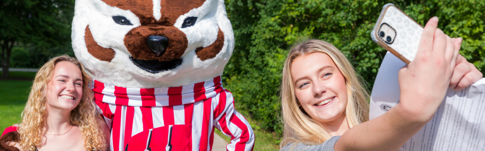 Two girls taking a selfie with Bucky
