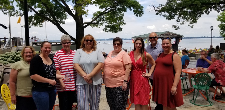 Business Services staff pose for a group photo at Memorial Union Terrace