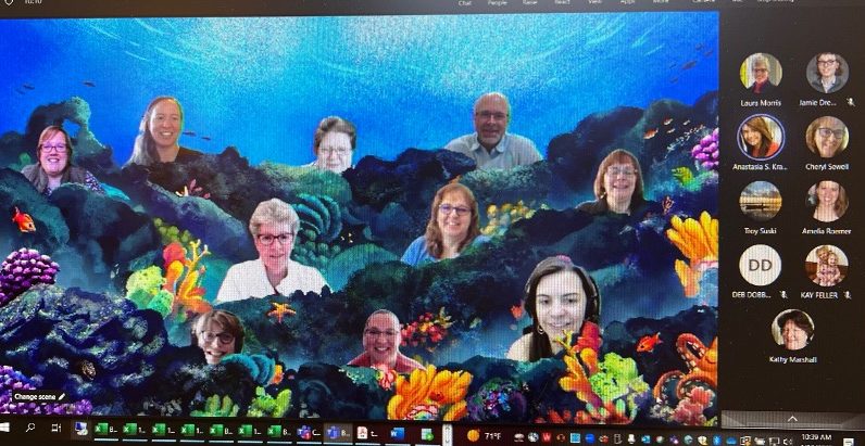 A virtual image of the Business Services team under the sea