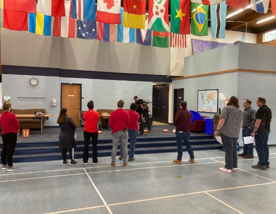 UA staff congregate in the Community Center