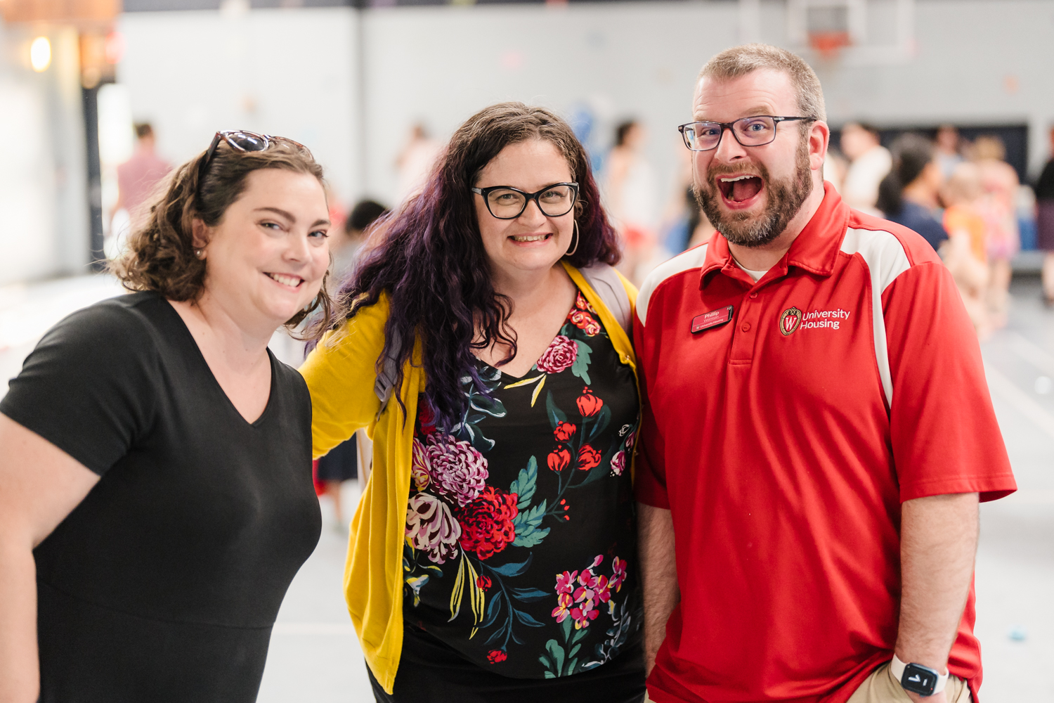 Three Housing staff posing for a group photo