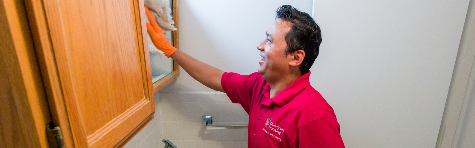 UA Custodial staff cleaning an apartment