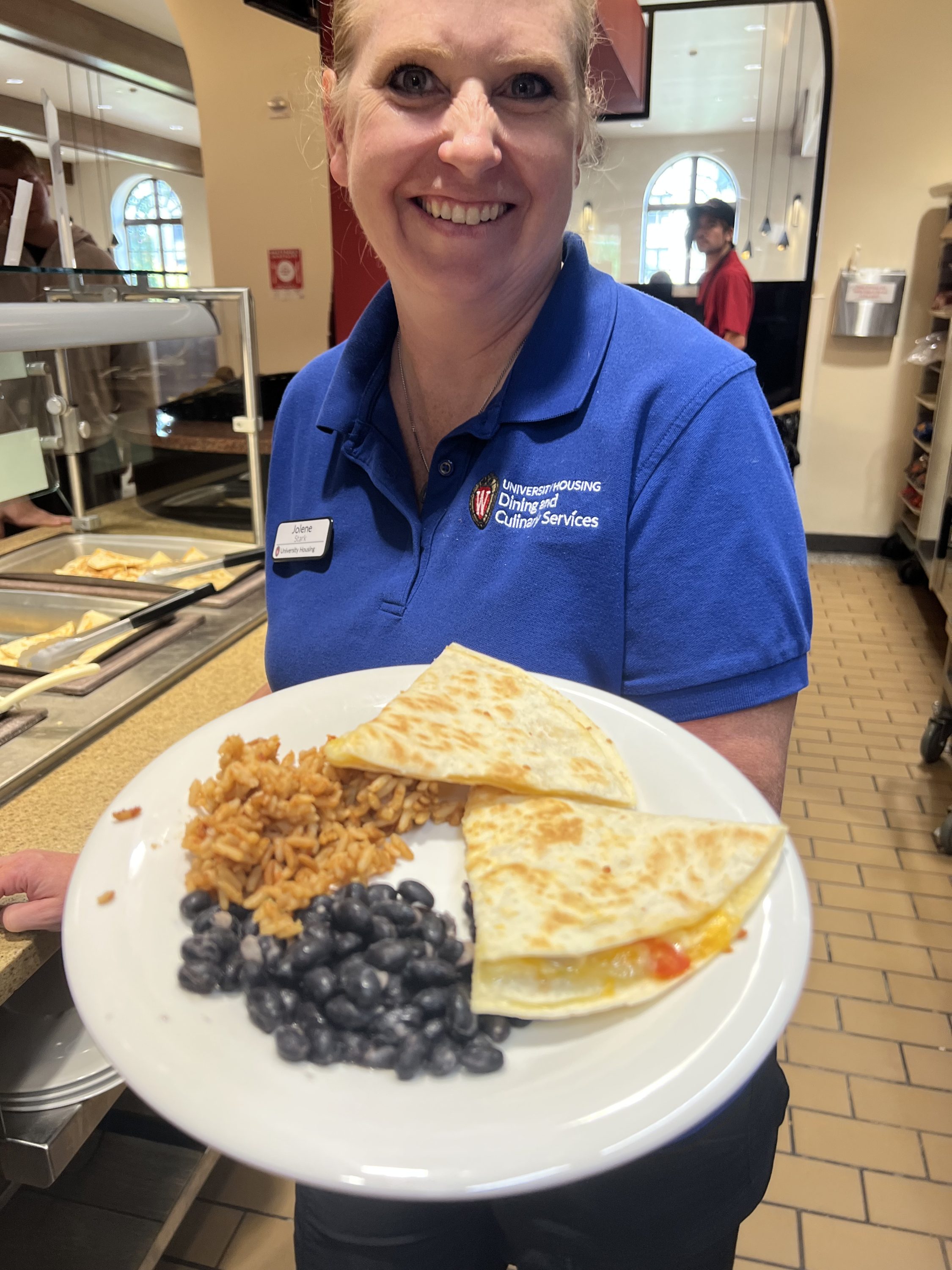 Quesadillas plated with rice and beans