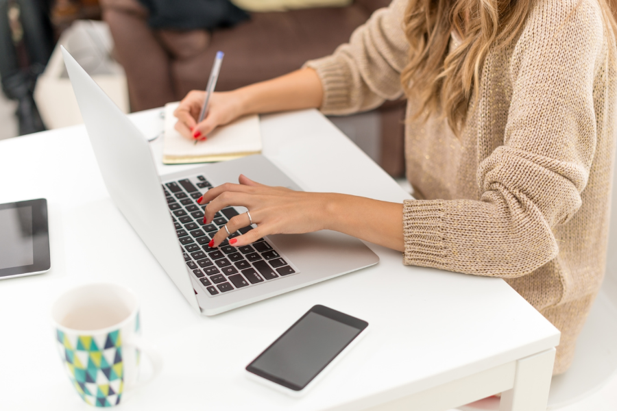 Women typing on keyboard