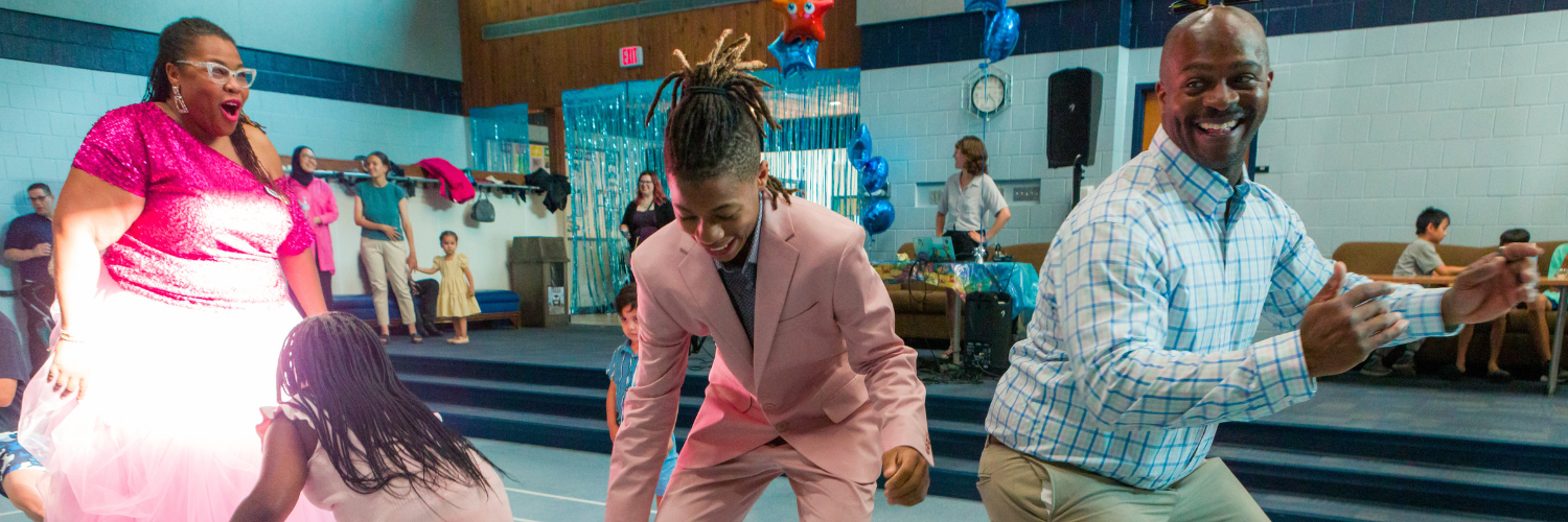 UA Family at the Famiky Prom event dancing to music