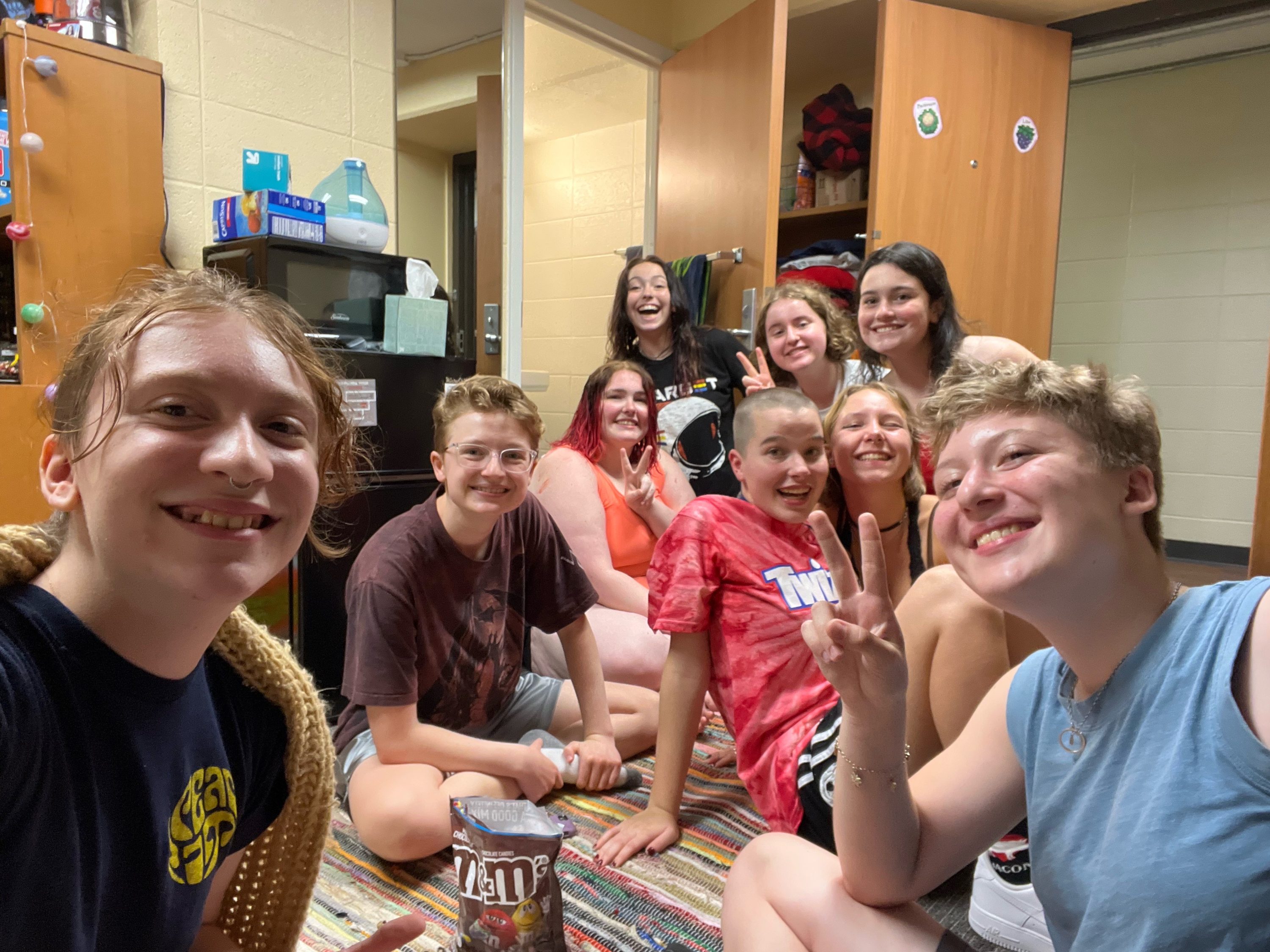 Open House residents in a Phillips Residence Hall room