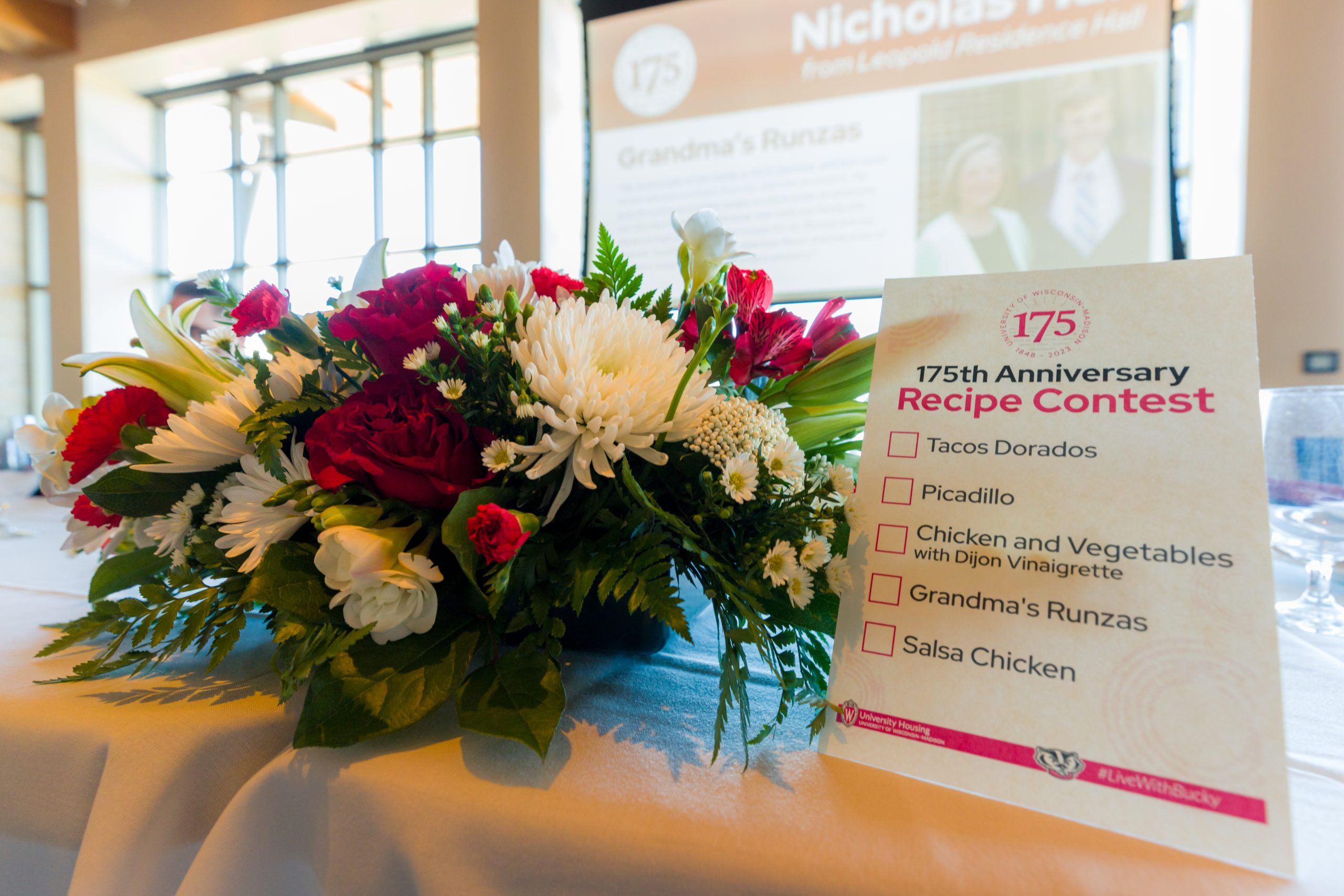Flowers and a Recipe Contest sign