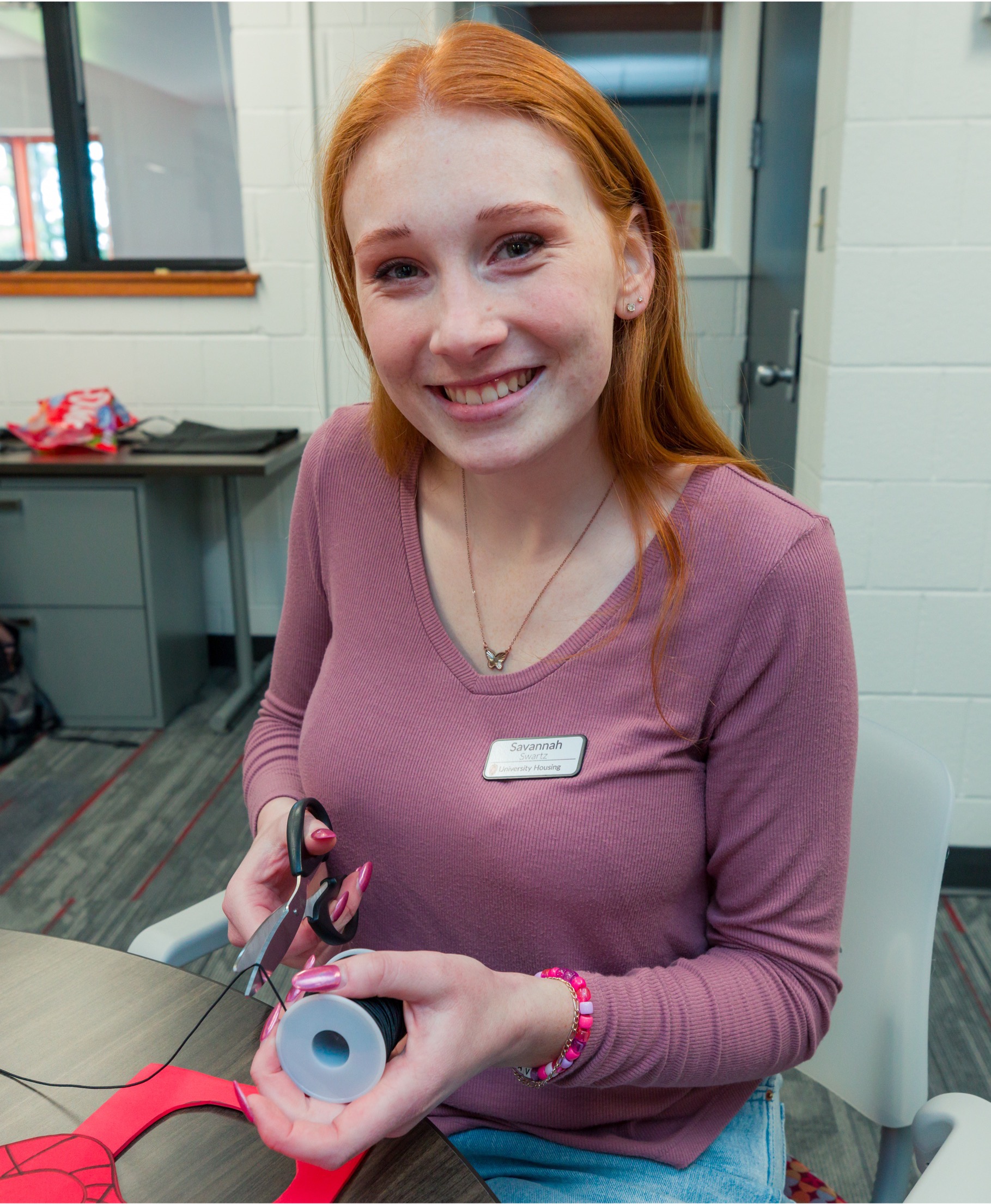 A 2024 ROSE Award winner posing for a photo while on the job