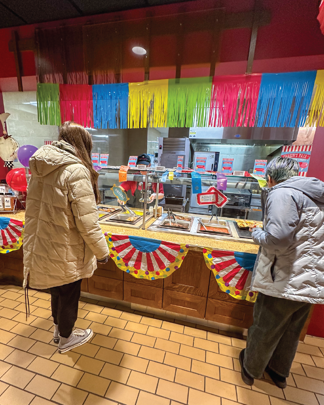 Carson's Market decorated for Carson's Fair special event with students checking out food