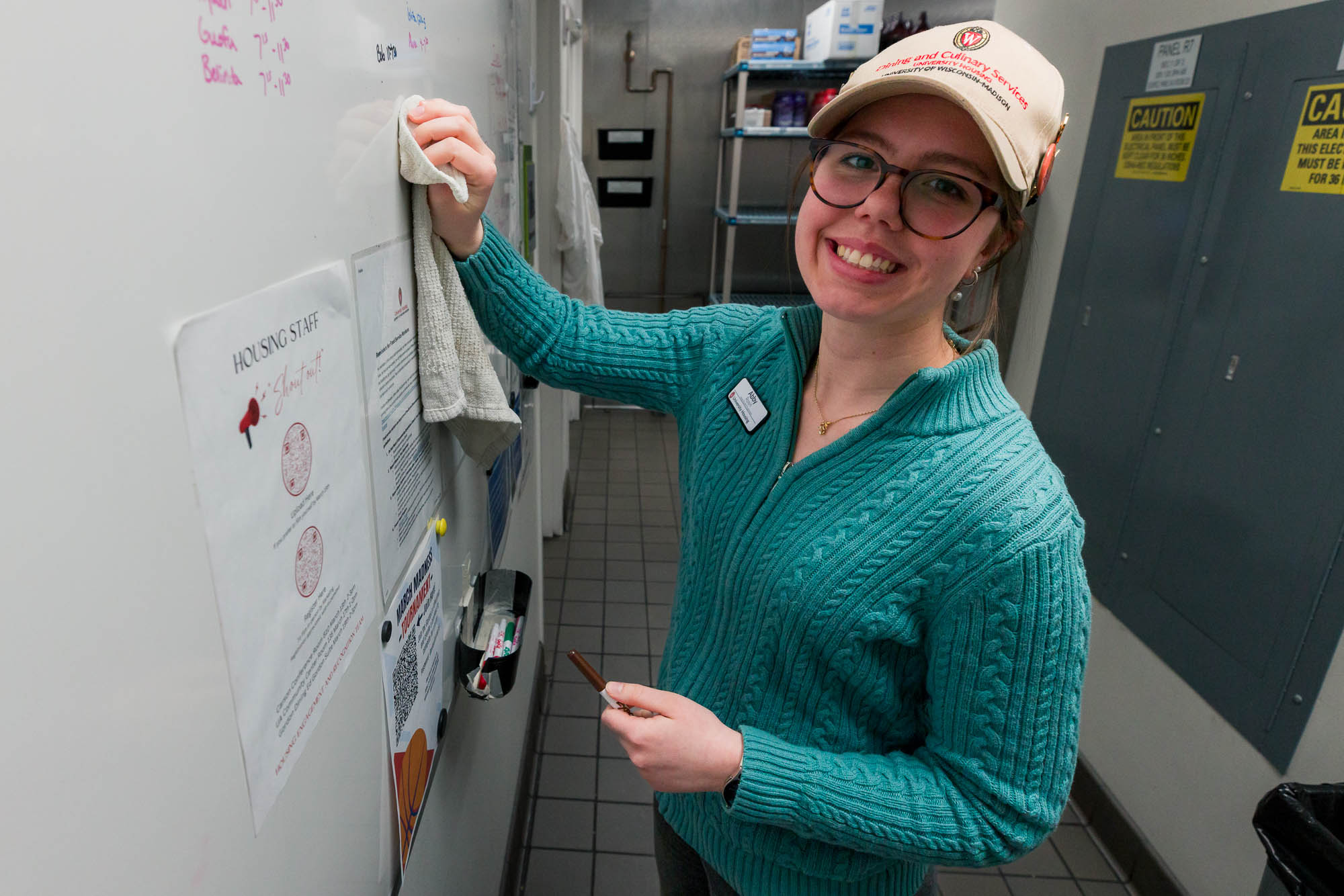 Abby Rosin erases a whiteboard in Gordon.
