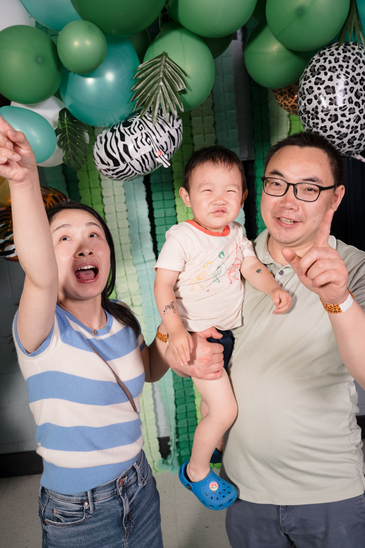 Family of three smiling