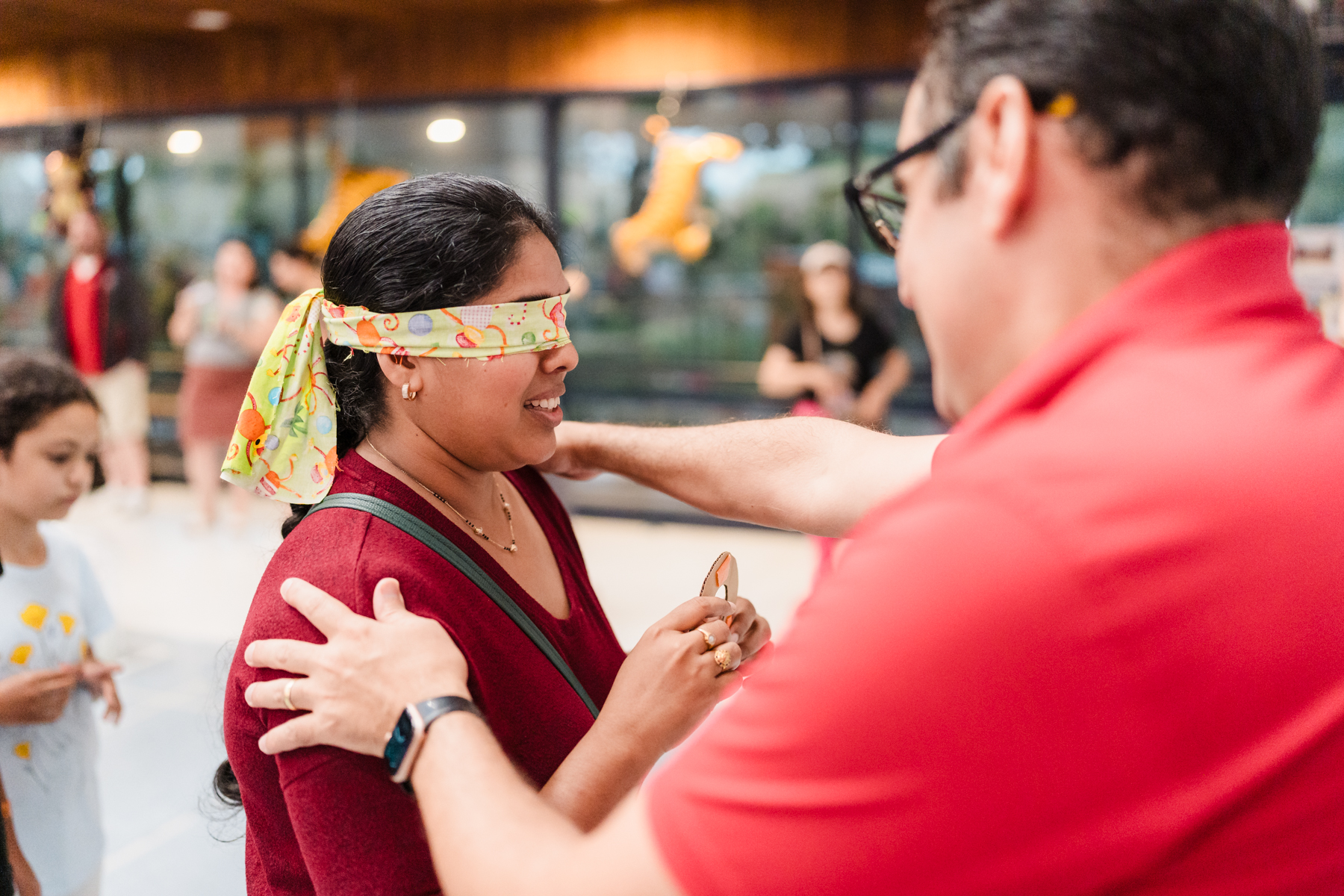 Women blindfolded for game
