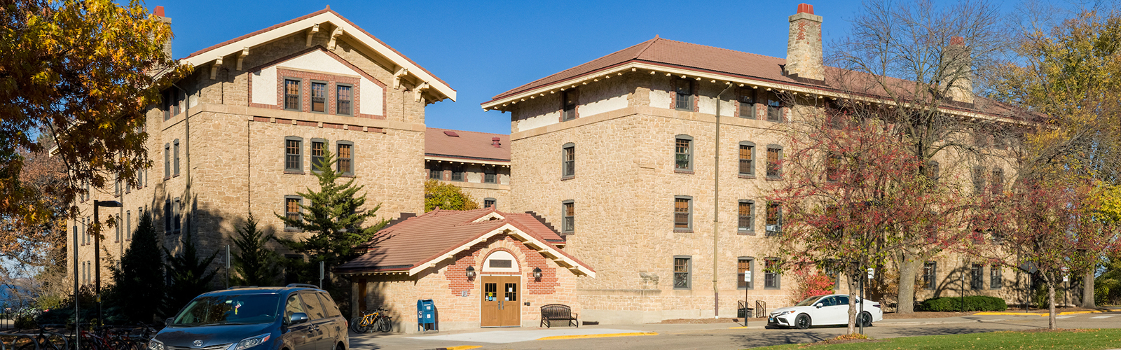 Exterior of Tripp Residence Hall in the fall